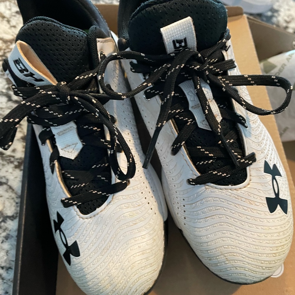 Boys size 1.5, cleats, worn one season. Lots of life in these.